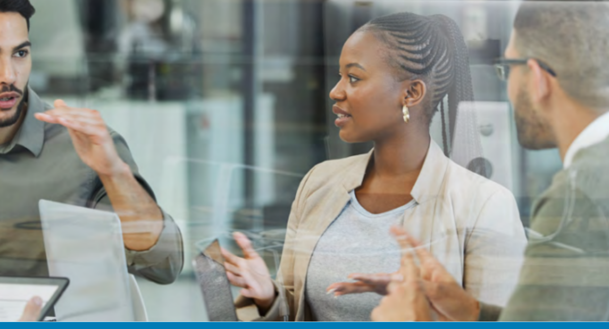 Co-Workers discuss Clariti Enterprise at the office