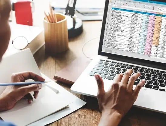 Computer screen shows data about using automation to close the books faster
