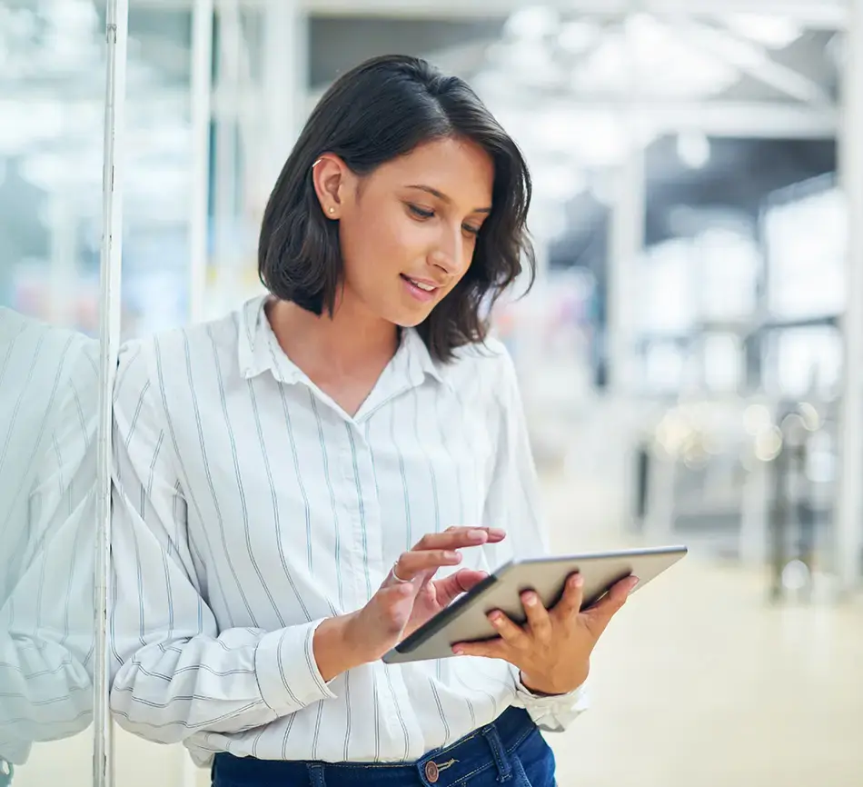 Business woman using SAP Business AI on her tablet