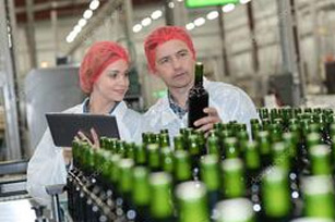 depositphotos_130541644-stock-photo-portrait-of-brewers-checking-beers